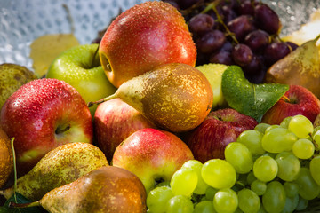 Fruit in a bowl - apples, pears and grapes
