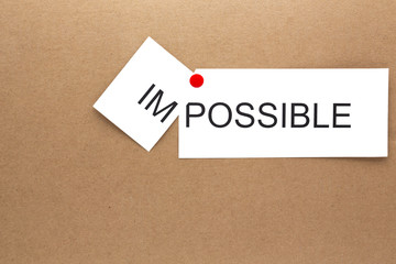 in the carboard the word imopossible