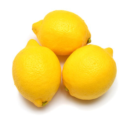 Three lemons isolated on white background. Tropical fruit. Flat lay, top view