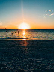 Maldives island luxury beach resort sunset