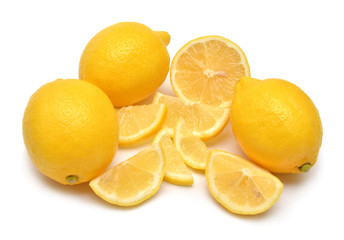 Lemons creative whole and slices isolated on white background. Yellow fruit. Flat lay, top view