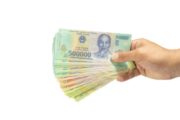 clipping path Money in Vietnam on hand (Socialist Republic Of Vietnam), Dong, VND, Pay, exchange money isolated on white background.