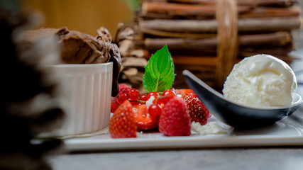 Ice cream with strawberries, mousse dessert served at restaurant