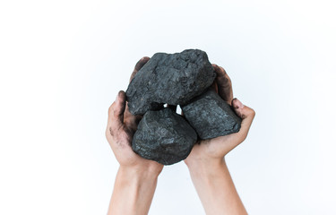 Coal mining: coal miner in hands. The idea of the picture is to extract a mineral or energy source...