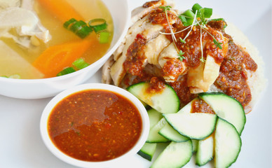 Hainanese chicken rice or steamed chicken and white rice (Thai name is Khao Man Kai).
Thai style chicken menu with rice.