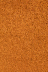 Fototapeta premium Wall of adobe, earth, mud, straw, pressed. Old, traditional and sustainable construction. Eroded by the passage of time and weather.