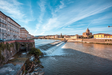 Fototapeta premium The Church of San Frediano and the Arno River spillway, Florence, Italy
