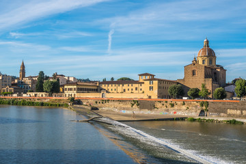 Fototapeta na wymiar The Church of San Frediano and the Arno River spillway, Florence, Italy