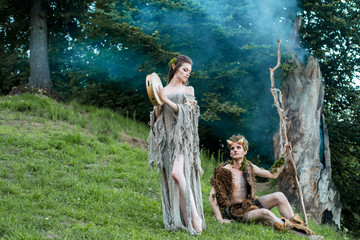 Enamored elves. beautiful fairy girl elf and a guy of the forest king.The concept of chelowin