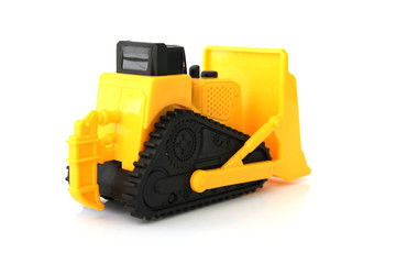 Fototapeta premium A Toy bulldozer on an isolated white background 8
