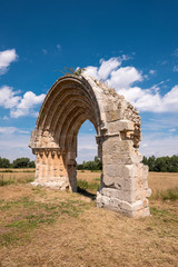 Naklejka premium Ruined medieval arch of San Miguel de Mazarreros, in Olmillos de Sasamon. Burgos, Spain.