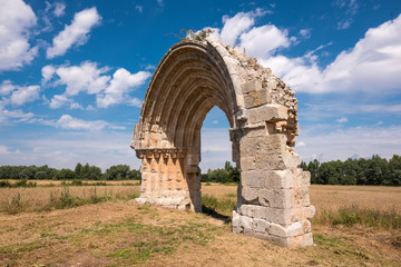Fototapeta na wymiar Ruined medieval arch of San Miguel de Mazarreros, in Olmillos de Sasamon. Burgos, Spain.