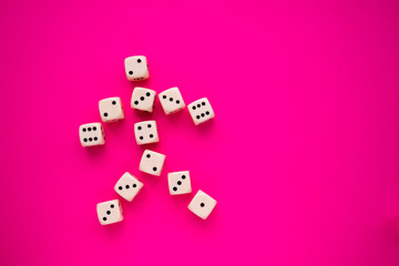dice on a magenta background, in the form of a man