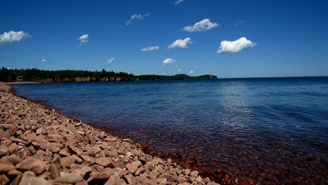 Iona's Beach on the north shore of Lake Superior in Minnesota on a sunny day. Time lapse.