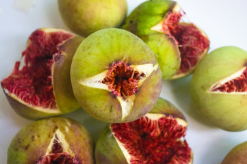 Ripe figs fruit on a plate, close up