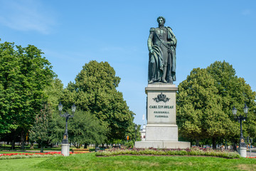Karl Johans park during the summer of 2018 in Norrkoping with the statue of king Karl Johan XIV. Norrkoping is a historic industrial town in Sweden.