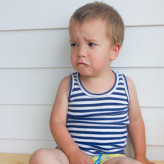 The little boy was offended. The child pouted.