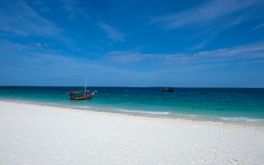 View of the Indian ocean. Ships and boats on the water. Beautiful nature of island Zanzibar. Tanzania
