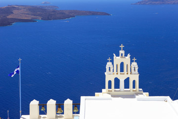 Greece, greek islands typical view with white church and blue sea, Santorini