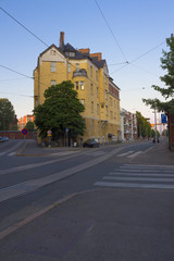 Fototapeta na wymiar Historical buildings in Helsinki Street on a summer evening. Travel to Finland