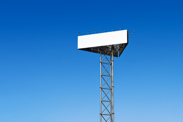 Blank billboard against a blue sky