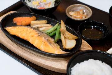 Grilled Salmon with Vegetables and Rice. Japanese food set.