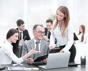 business team discussing with the head of financial data