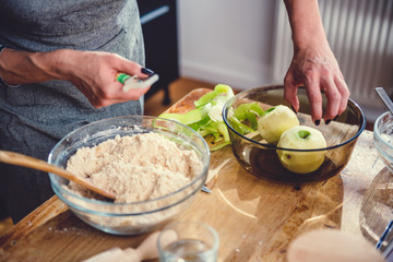 Woman peeling apples