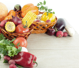 frame of fresh vegetables on a wooden background