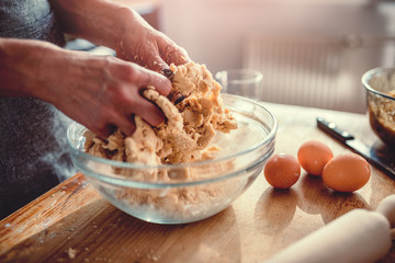 Woman kneading dough