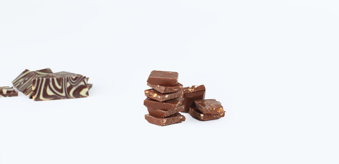 slices of original milk chocolate .isolated on white