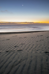 Fototapeta na wymiar Amazing sunset over the Pacific Ocean at 