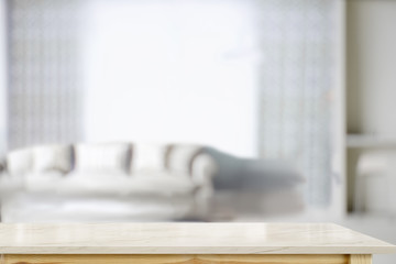 Marble table top and blur interior living room  background. For product display montage