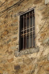 Old window on a concrete wall