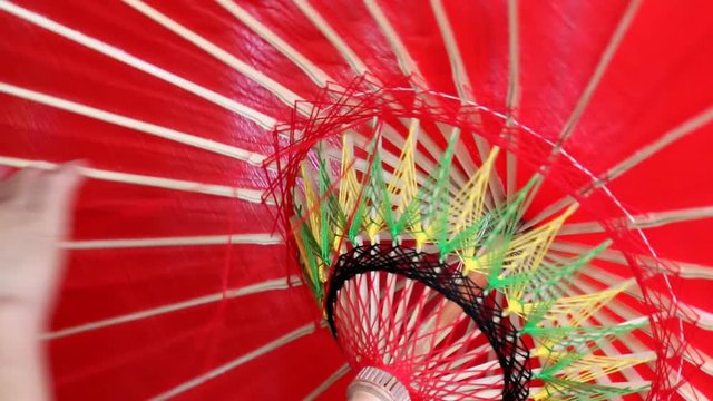 Hand making umbrella
