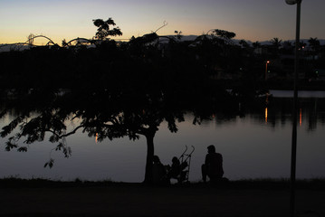 Family sunset on lake