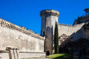 Medieval built Avignon city stone wall at French Provence