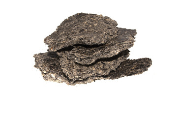 crushed sunflower seeds isolated on white background