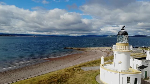 Flight over Cromarty Lighthouse at Cromarty Firth in the Scotland - aerial footage