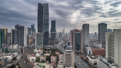 Aerial view of highway and buildings in West Yan`an road, Shanghai city on a cloudy day