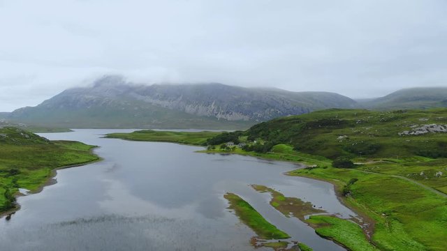 The typical landscape of the Scottish Highlands - aerial drone footage
