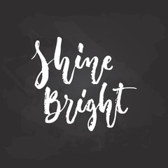 Shine Bright - hand drawn Summer seasons holiday lettering phrase isolated on the white background. Fun brush ink vector illustration for banners, greeting card, poster design.