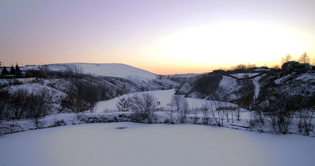Fototapeta premium View of the countryside hills in the late evening after sunset.