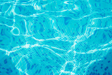 Bright blue surface swimming pool water background