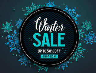 Winter sale vector banner template with colorful snowflakes elements and black empty circle for discount text in snow background for winter promotion. Vector illustration.

