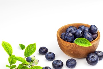 Fresh blueberries on a white background. Healthy summer fruit. Taste of summer. Growing of blueberries. Advertising on blueberries.