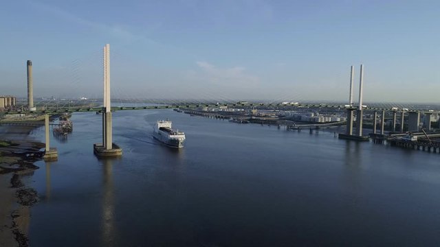 Static aerial clip as  ro-ro cargo ship Adeline passes under Queen Elizabeth II Bridge