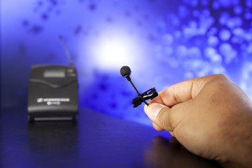 Lapel Microphone with Clamp in Hand