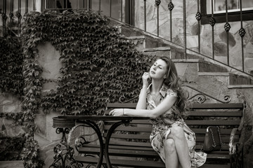Obraz premium Nature, summer holidays, vacation and people concept - young woman dreaming about good life and enjoy the moment 