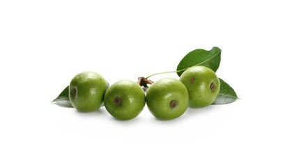 Wild, young green pears with twig and leaves isolated on white background